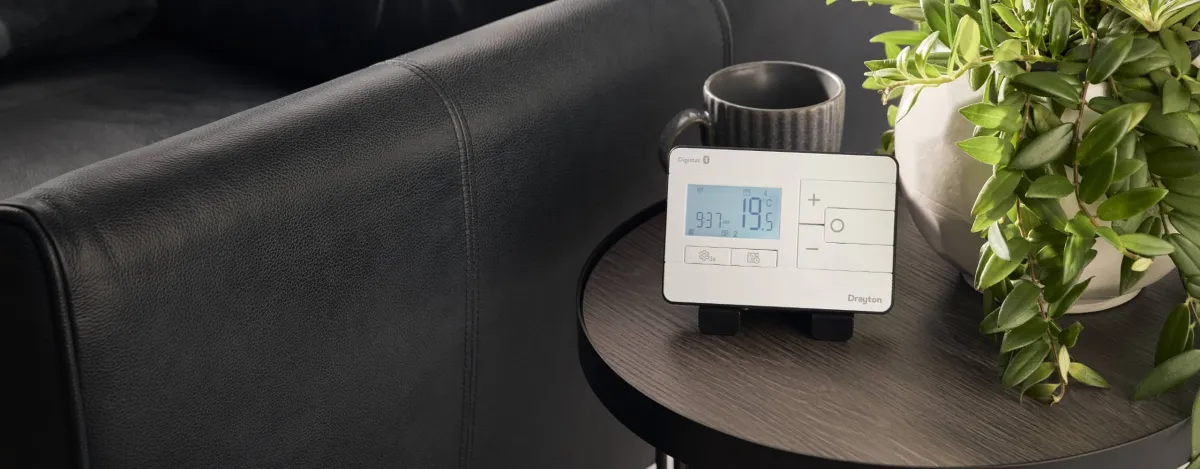 New Digistat sitting on wooden side table