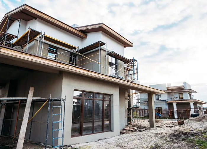 A modern domestic building in the final stages of construction
