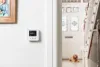 wiser thermostat on a wall