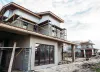 A modern domestic building in the final stages of construction