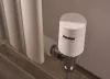 Wiser's smart radiator thermostat installed on a radiator valve