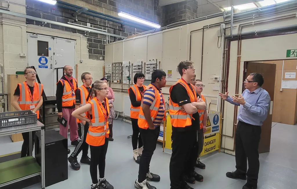 Students take part in a factory and labs tour of Drayton Controls in Plymouth as part of its STEM outreach program