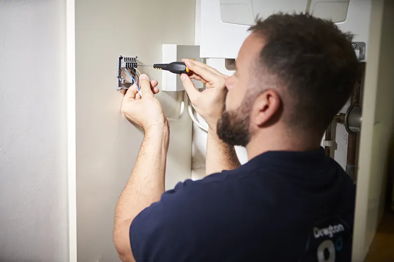 Drayton heating controller installation on standard UK wall plate